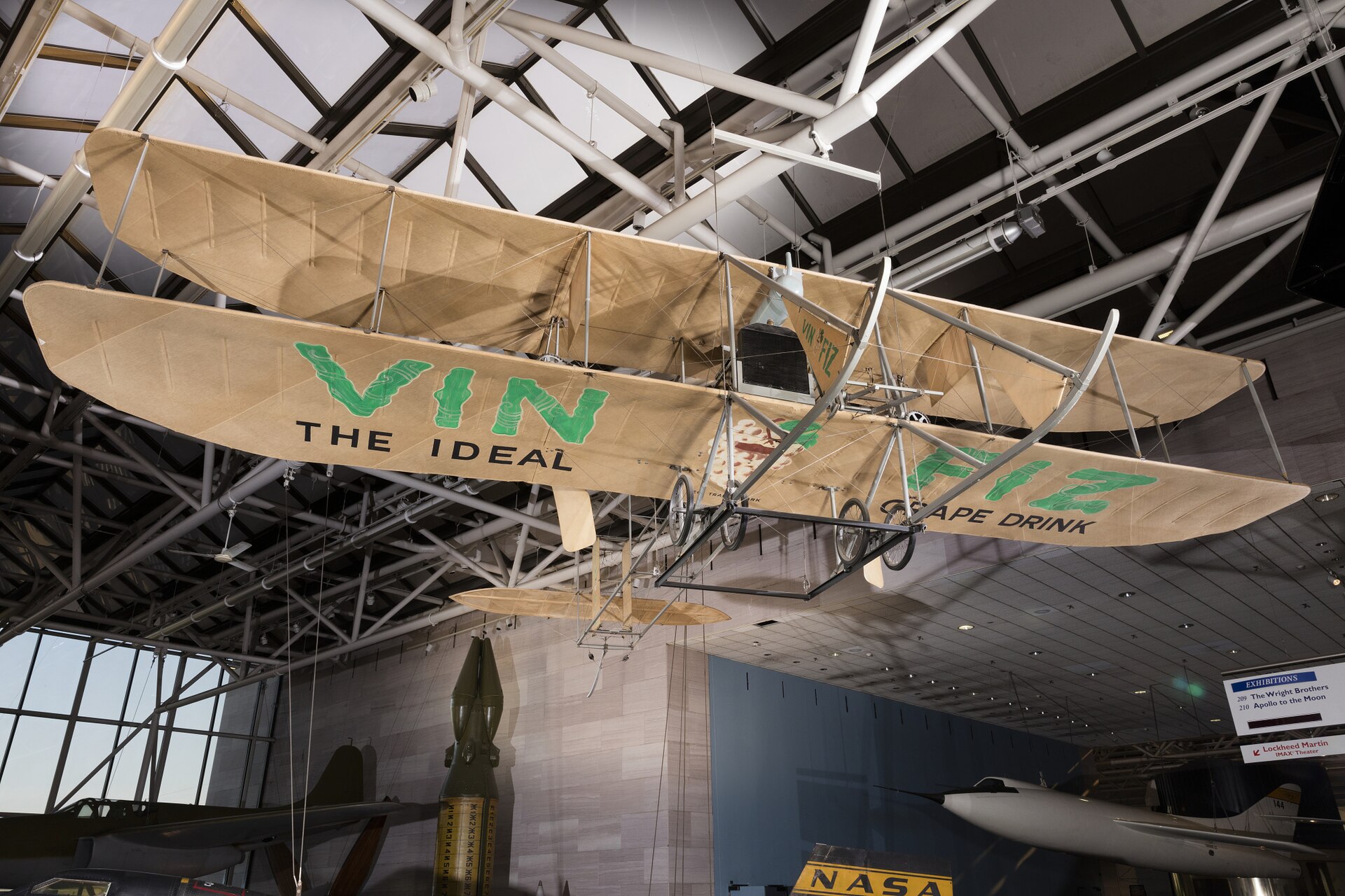 Wood and fabric biplane. Single 35-horsepower Wright vertical four-cylinder engine driving two pusher propellers via sprocket-and-chain t…